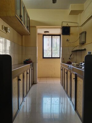 Kitchen in 1 BHK Apartment at Ami Vini Solitaire, Dahisar West – for Rent