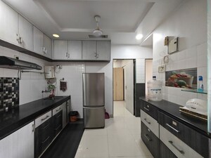 Kitchen in 2 BHK Apartment at Vijay Nagari Annex, Waghbil – for Rent