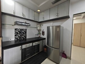 Kitchen in 2 BHK Apartment at Vijay Nagari Annex, Waghbil – for Rent
