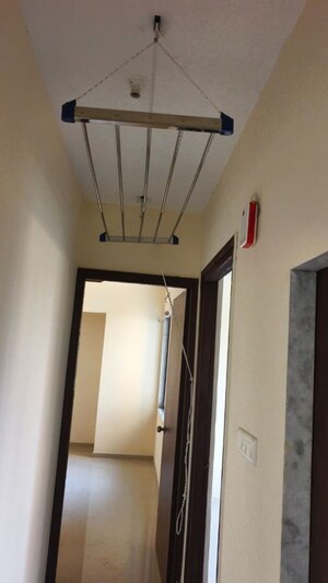 Building Lobby in 2 BHK Apartment at Ram Pushpanjali Residency, Owale – for Rent