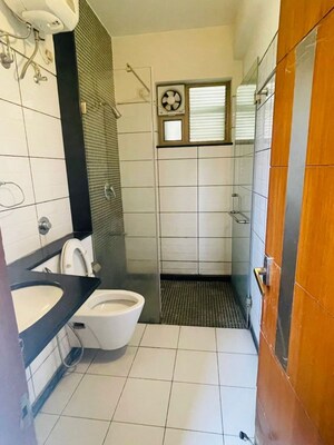 Bathroom in 4 BHK Apartment at Halasuru – for Rent