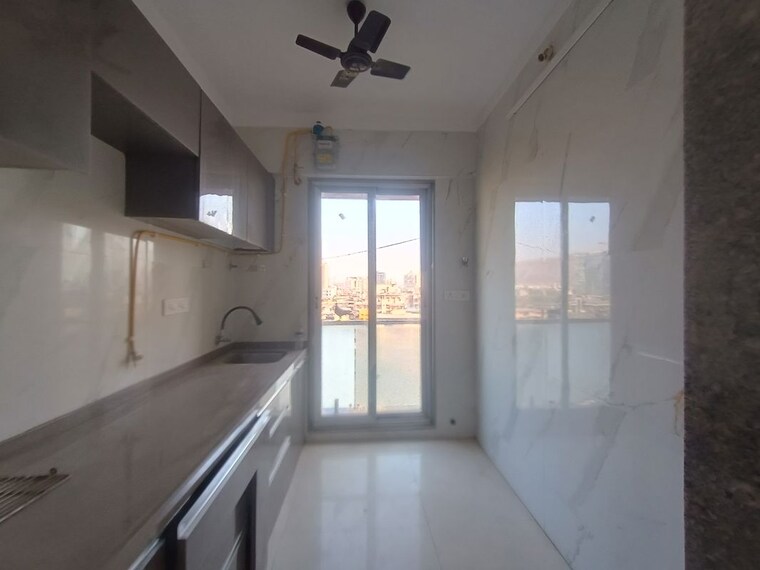 Kitchen, shubh-satyam-harmony 2 Bedroom 985 Sq.Ft. Apartment In Kopar Khairane Navi Mumbai 10283042