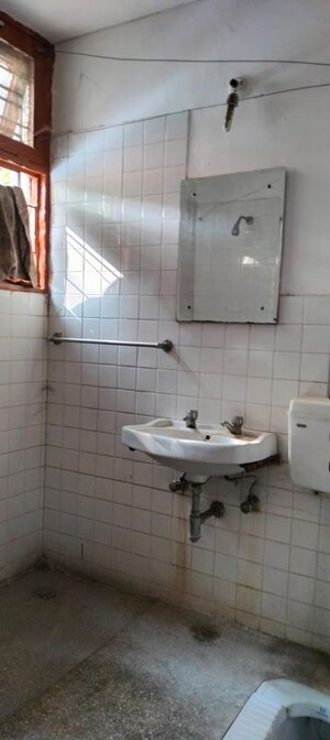 Bathroom in 2 BHK Apartment at Rail Vihar Apartment, Sector 15 – for Rent