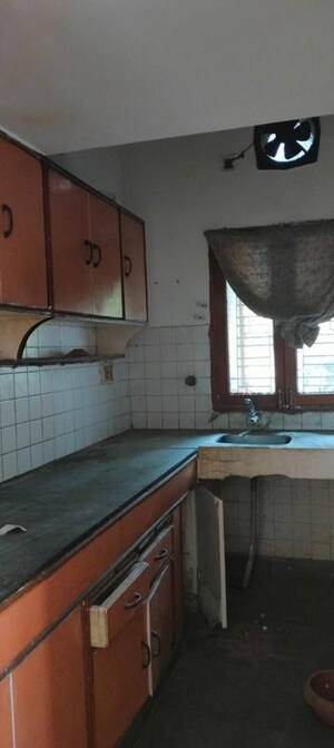 Kitchen in 2 BHK Apartment at Rail Vihar Apartment, Sector 15 – for Rent