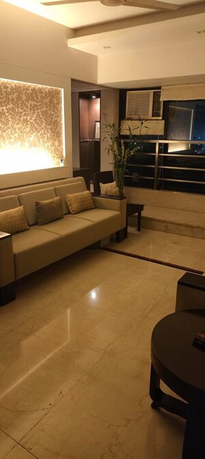 Living Room in 4 BHK Apartment at Andheri West – for Sale