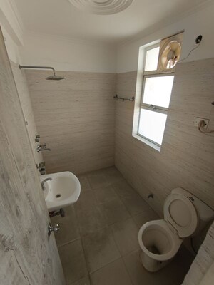 Bathroom in 3 BHK Apartment at Omaxe The Olive Heights, Sector 56 – for Rent