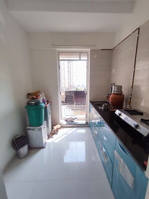 Kitchen in 1 BHK Apartment at Puranik Aarambh, Ghodbunder Road – for Sale