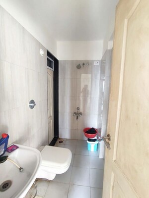 Bathroom in 1 BHK Apartment at Puranik Aarambh, Ghodbunder Road – for Sale