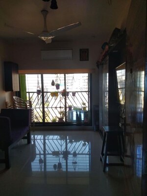 Living Room in 2 BHK Apartment at Shri Balaji Ashirwad, Malad West – for Sale
