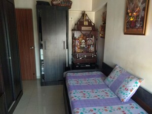 Living Room in 2 BHK Apartment at Shri Balaji Ashirwad, Malad West – for Sale