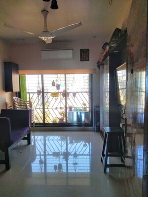 Living Room in 2 BHK Apartment at Shri Balaji Ashirwad, Malad West – for Sale