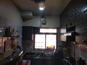 Kitchen in 2 BHK Apartment at Shri Balaji Ashirwad, Malad West – for Sale