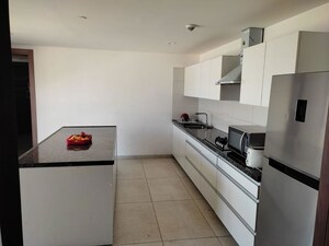 Kitchen in 4 BHK Apartment at Panchshil Eon Waterfront I, Kharadi – for Rent