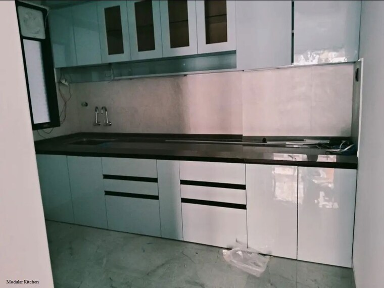 Kitchen, unique-youtopia 2 Bedroom 752 Sq.Ft. Apartment In Kharadi Pune 10314130