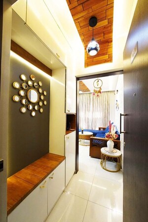 Living Room in 2 BHK Apartment at Shapoorji Pallonji Joyville Hinjewadi, Hinjewadi – for Sale