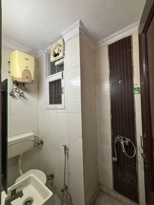 Bathroom in 4 BHK Apartment at Sector 6 Dwarka – for Rent