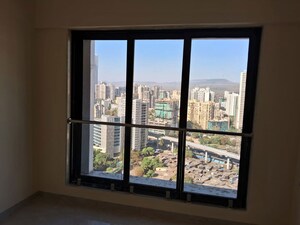Room in 2 BHK Apartment at IM Applaud 38, Goregaon East – for Rent