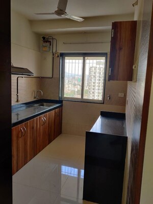 Kitchen in 2 BHK Apartment at Omkar Signet, Malad East – for Rent
