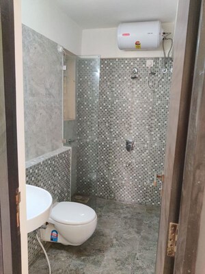 Bathroom in 2 BHK Apartment at Omkar Signet, Malad East – for Rent