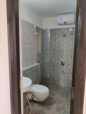 Bathroom in 2 BHK Apartment at Omkar Signet, Malad East – for Rent