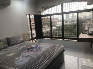 Bedroom in 2 BHK Apartment at Gold Coin Apartment, Borivali West – for Rent