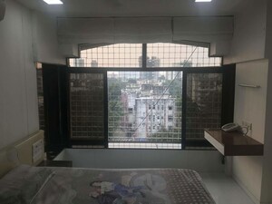 Bedroom in 2 BHK Apartment at Gold Coin Apartment, Borivali West – for Rent