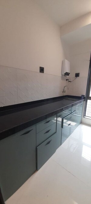 Kitchen in 2 BHK Apartment at Raj Infinia, Malad West – for Rent