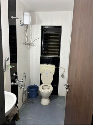 Bathroom in 2 BHK Apartment at Happy Valley Homes, Manpada – for Rent