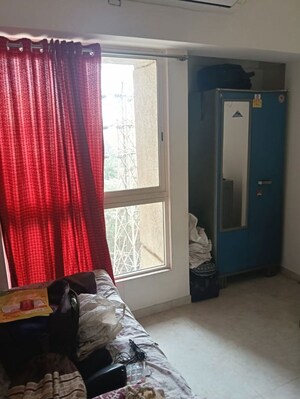 Living Room in 1 BHK Apartment at Lodha Amara, Kolshet Road – for Rent