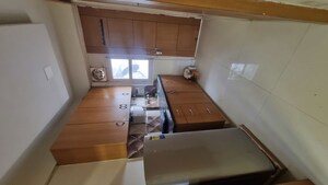 Kitchen in 2 BHK Apartment at Pareena Om Apartments, Sector 112 – for Rent