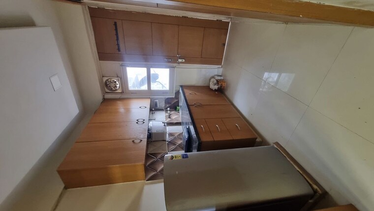 Kitchen, pareena-om-apartments 2 Bedroom 785 Sq.Ft. Apartment In Sector 112 Gurgaon 10323376