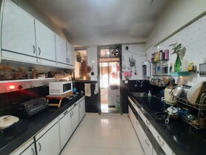 Kitchen in 3 BHK Apartment at Gokuldham Colony – for Sale