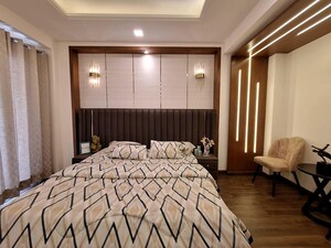 Bedroom in 4 BHK Builder Floor at Ansal API Esencia, Sector 67 – for Sale