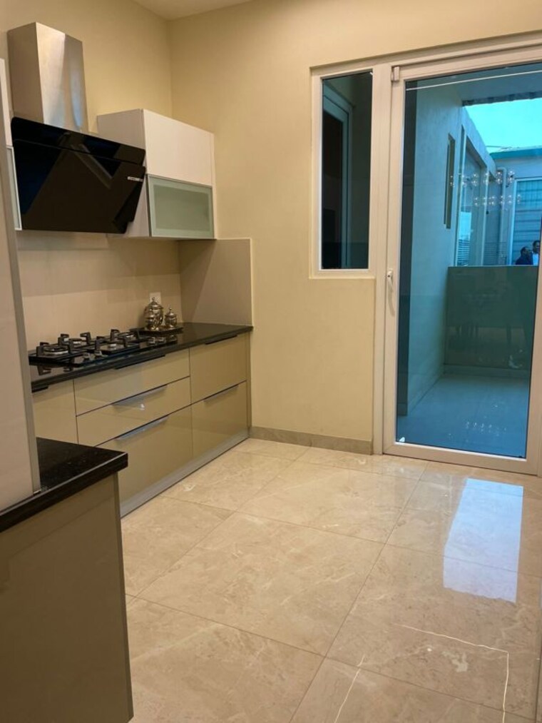 Kitchen, artique-uptown-skylla 2 Bedroom 1400 Sq.Ft. Apartment In International Airport Road Zirakpur 10323650