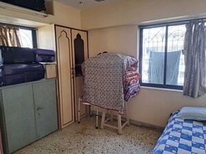Bedroom in 2 BHK Apartment at Prabhadevi – for Sale