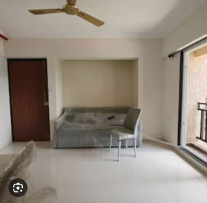 Living Room in 1 BHK Apartment at Rustomjee Urbania Acura, Thane West – for Sale