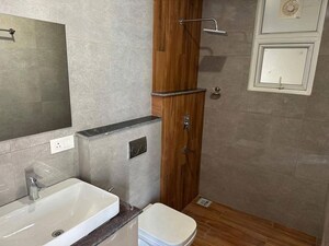 Bathroom in 3 BHK Apartment at Artique Uptown Skylla, International Airport Road – for Rent