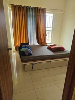 Bedroom in 2 BHK Apartment at Kolte Patil Life Republic Oro Avenue, Hinjewadi – for Rent