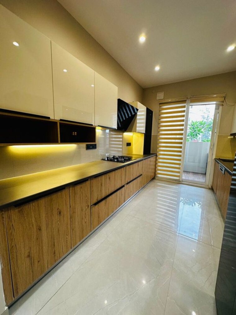 Kitchen, alaknanda-maxxus-eden-estate 3 Bedroom 1855 Sq.Ft. Apartment In Ghazipur Zirakpur 10323903