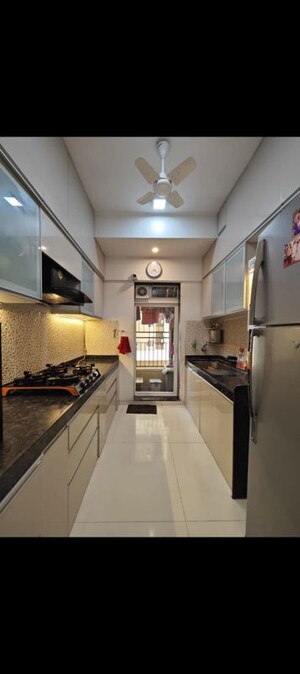 Kitchen in 2 BHK Apartment at Rustomjee Azziano Wing D, Thane West – for Rent