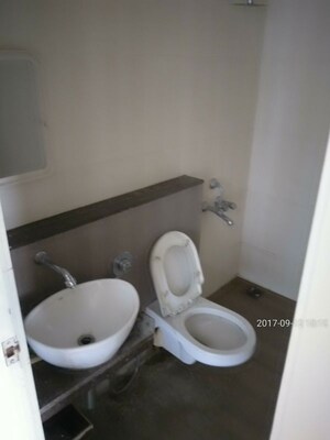 Bathroom in 2 BHK Apartment at DB Parkwoods, Kasarvadavali – for Rent