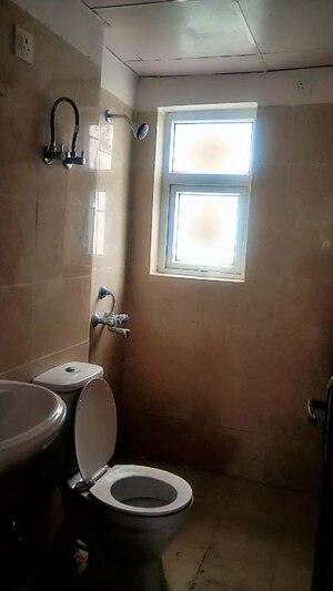 Bathroom in 3 BHK Builder Floor at Sector 77 – for Sale