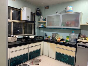 Kitchen in 3 BHK Apartment at Cosmos Park, Ghodbunder Road – for Rent
