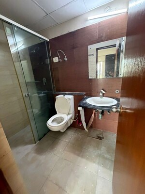 Bathroom in 3 BHK Apartment at Mahagun Moderne, Sector 78 – for Rent