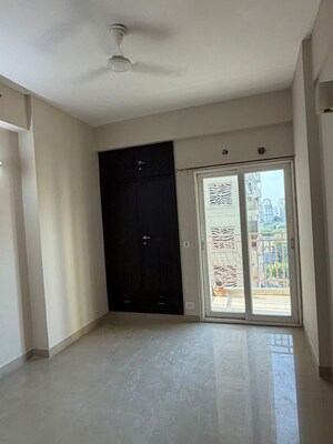 Room in 3 BHK Apartment at Mahagun Moderne, Sector 78 – for Rent