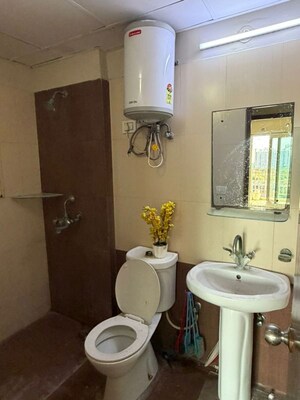 Bathroom in 3 BHK Apartment at Mahagun Moderne, Sector 78 – for Rent