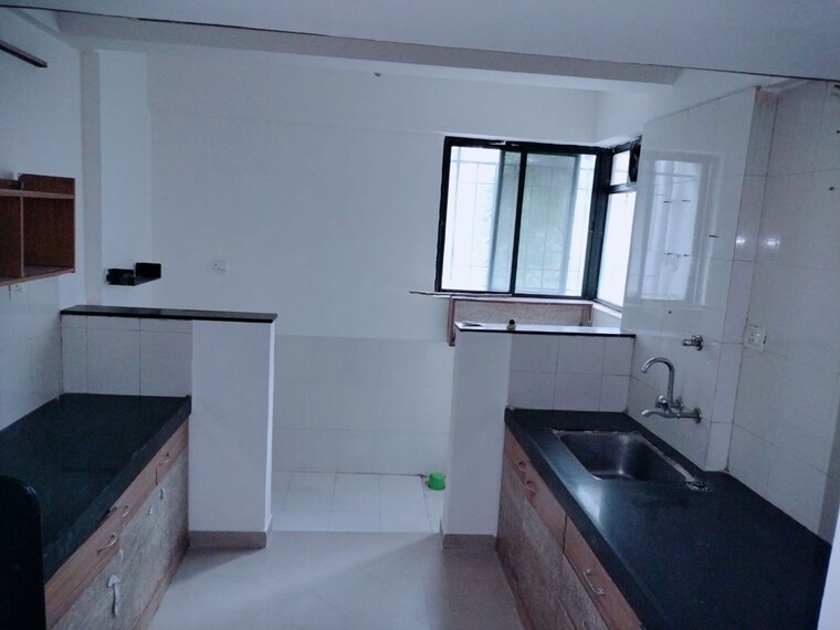 Kitchen, mont-vert-tropez 3 Bedroom 1250 Sq.Ft. Apartment In Wakad Pune 10324024