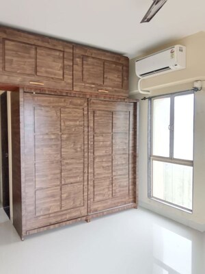 Room in 2 BHK Apartment at IM Applaud 38, Goregaon East – for Rent