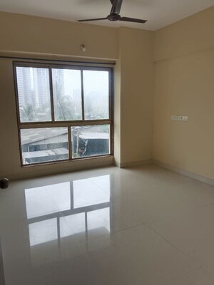Room in 2 BHK Apartment at IM Applaud 38, Goregaon East – for Rent