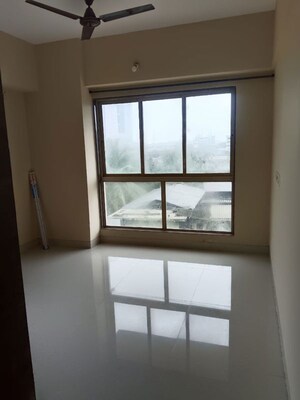 Room in 2 BHK Apartment at IM Applaud 38, Goregaon East – for Rent